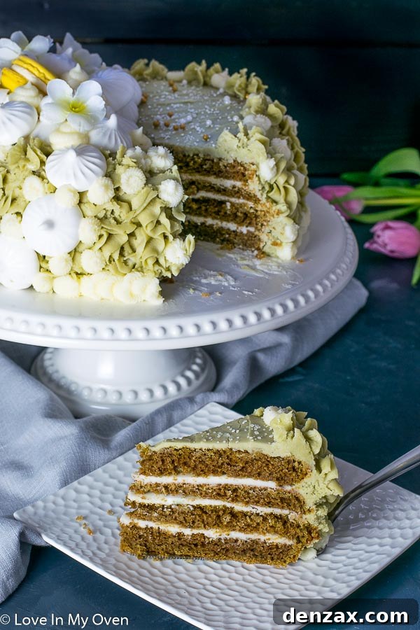 Overhead view of a perfectly sliced Matcha Vanilla Cake, showcasing its vibrant green layers.
