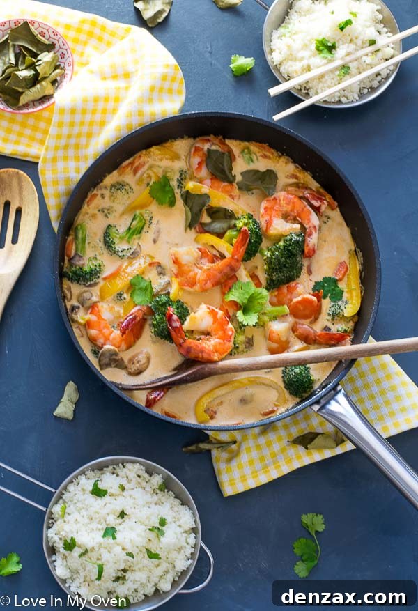red thai prawn curry with fresh ingredients