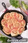 Rhubarb Streusel Rolls with a vibrant compote filling.