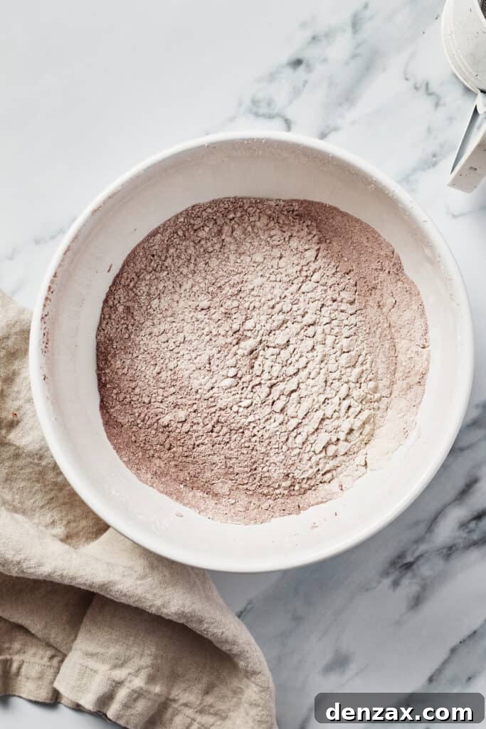 Dry ingredients sifted together in a mixing bowl.