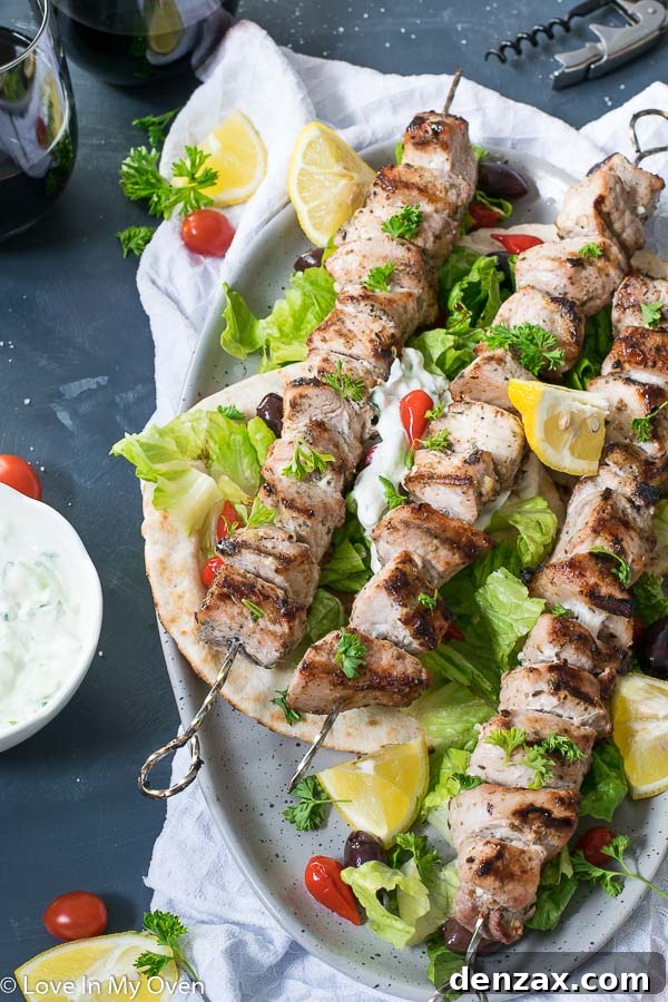 Close-up of juicy pork souvlaki skewers fresh off the grill