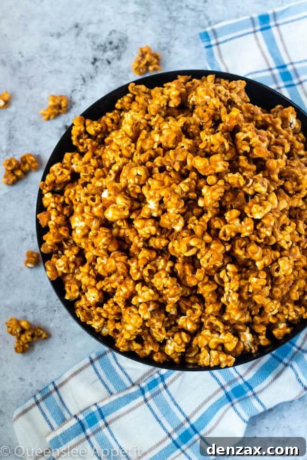 Homemade Caramel Popcorn, glistening with rich caramel sauce.
