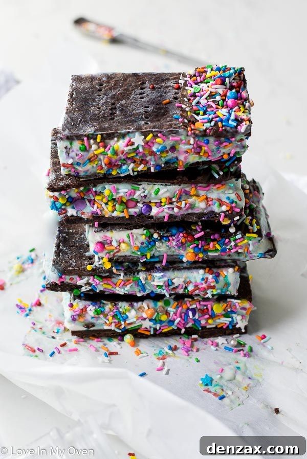 Delicious birthday cake ice cream sandwiches on a platter with sprinkles