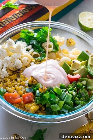 Another perspective of Mexican Street Corn Pasta Salad, highlighting its vibrant colors and textures