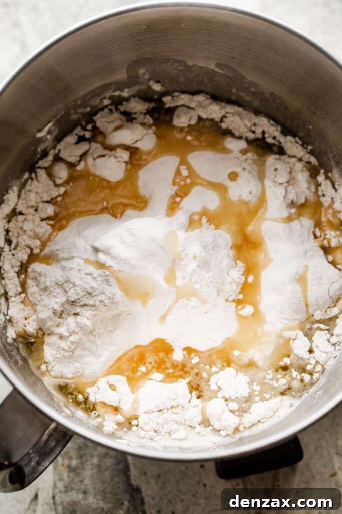 flour, oil, and yeast in a mixing bowl, ready for mixing.
