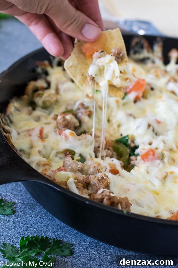 Closeup shot of Queso Fundido with Chorizo, showcasing the gooey cheese and chorizo bits