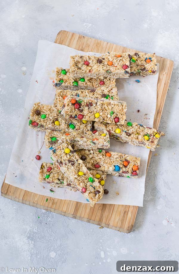 Close-up of freshly baked M&M Granola Bars, highlighting their chewy texture and colorful M&M's