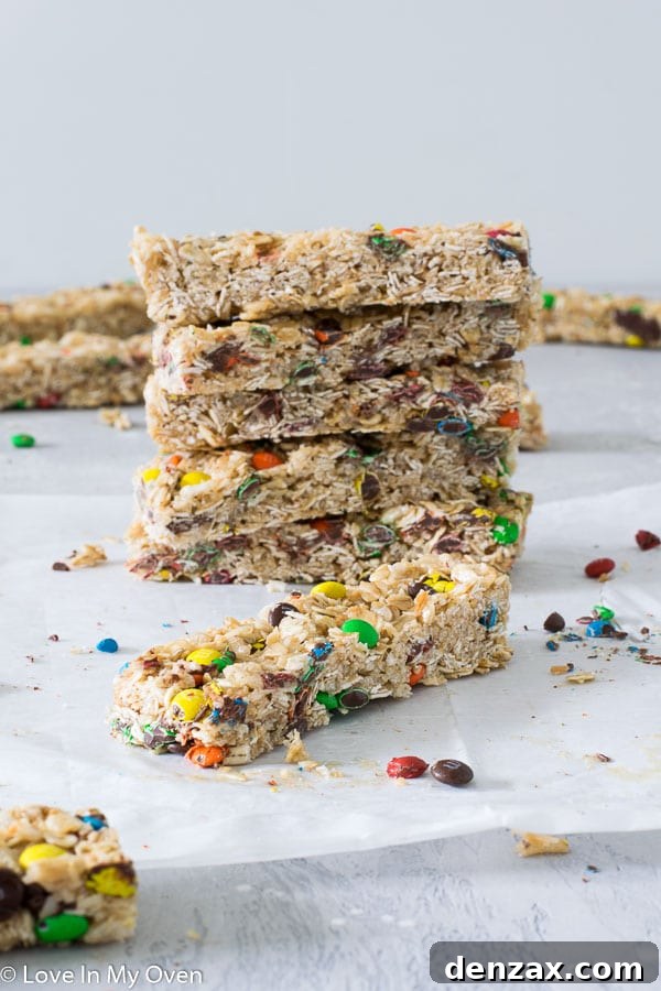 A vibrant close-up of M&M Granola Bars, showing off the colorful candy pieces