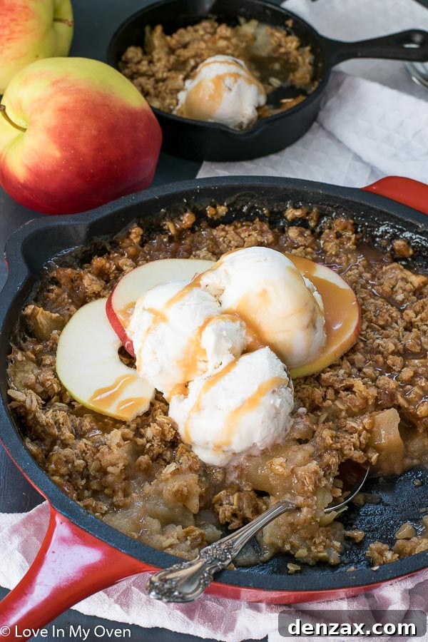 Delicious Salted Caramel Apple Crisp served with ice cream