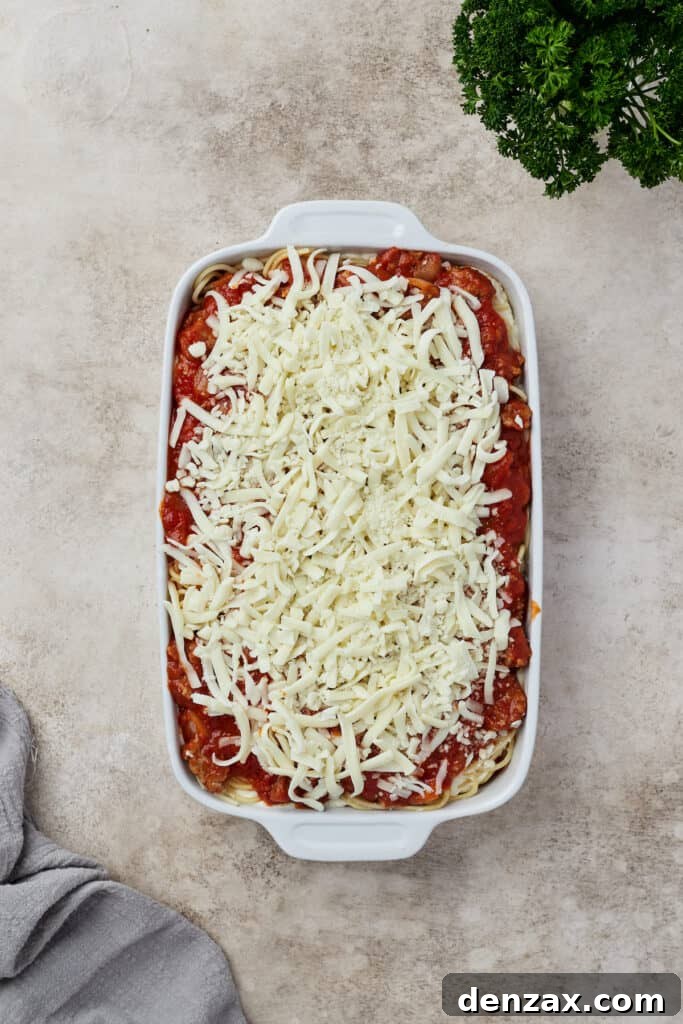 A layered, unbaked spaghetti casserole.