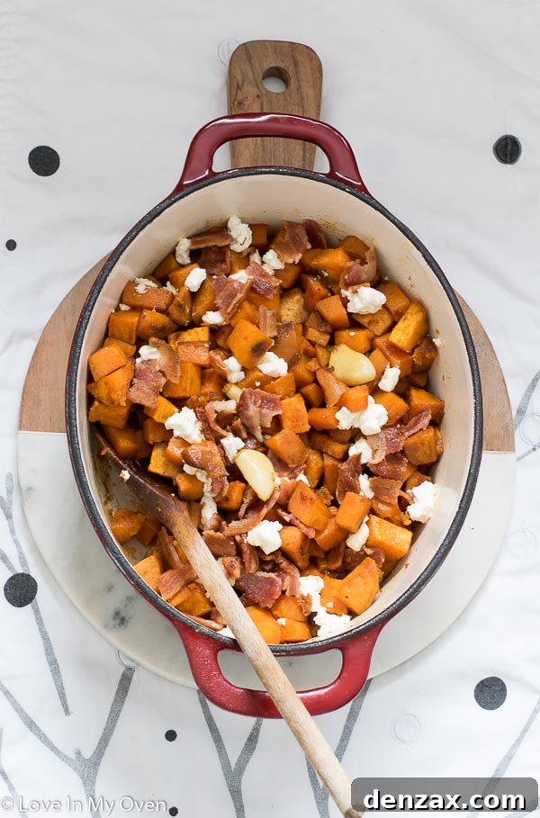 Close-up of Maple Roasted Sweet Potatoes with Crispy Bacon and Melted Goat Cheese