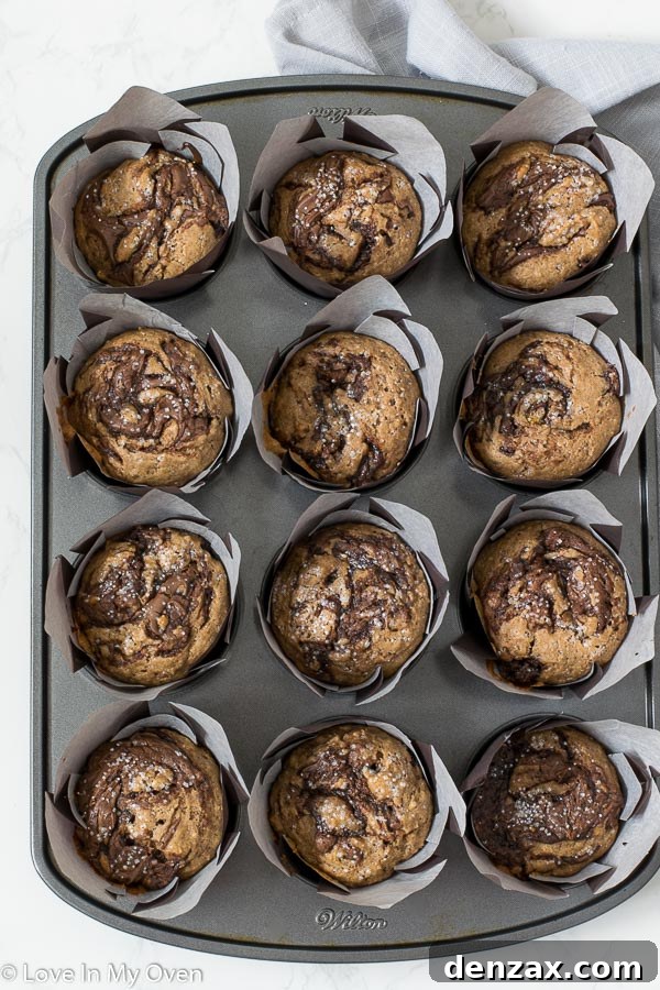 The ultimate cinnamon Nutella muffins, swirled with rich hazelnut spread and a hint of warm spice.