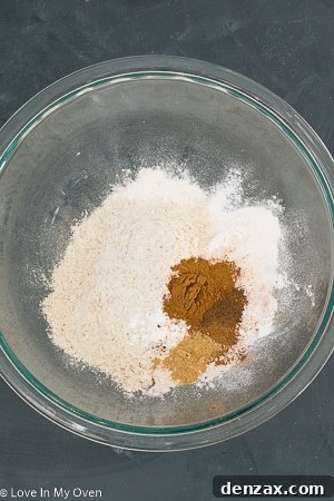 Mixing wet ingredients for pumpkin muffins