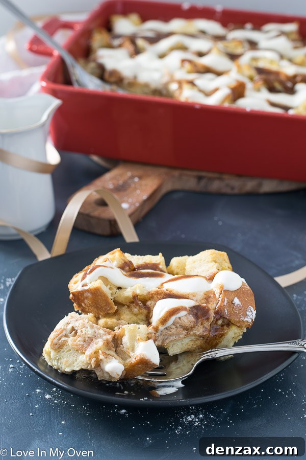 Close-up of overnight cinnamon French toast bake showing the soft bread and creamy toppings