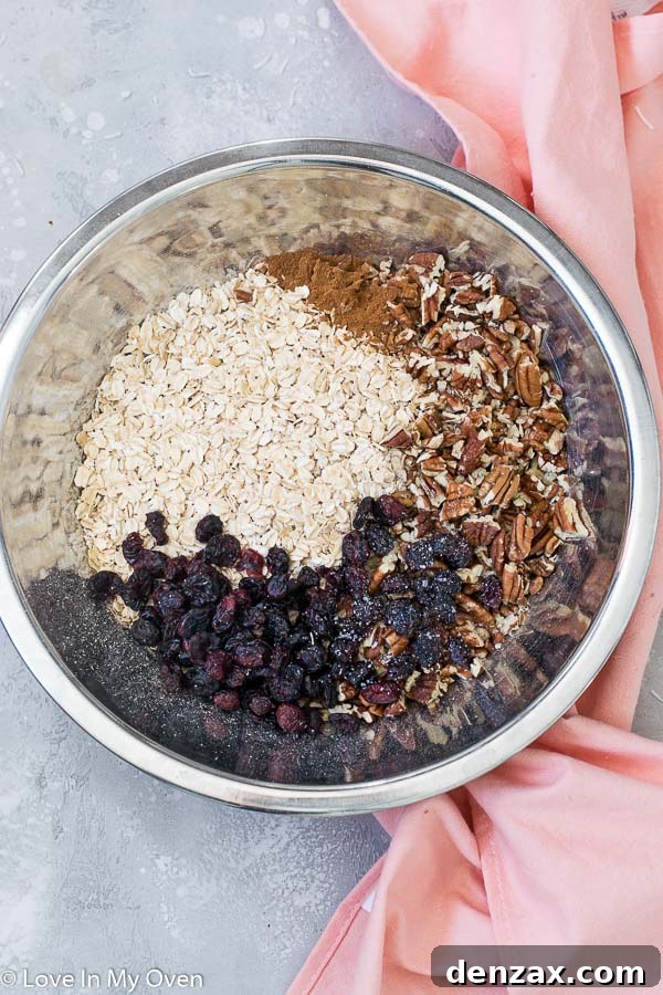 Close-up of baked cranberry pecan granola with white chocolate