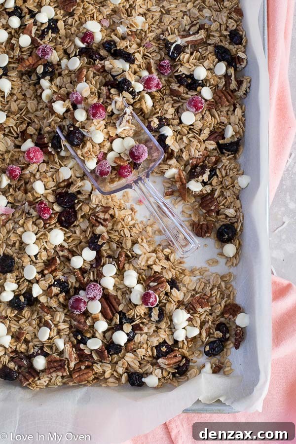 Homemade cranberry pecan granola in a glass jar
