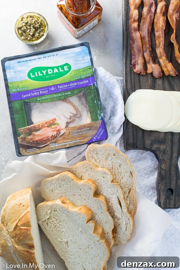 Preparing the ingredients for a delicious turkey pesto sandwich
