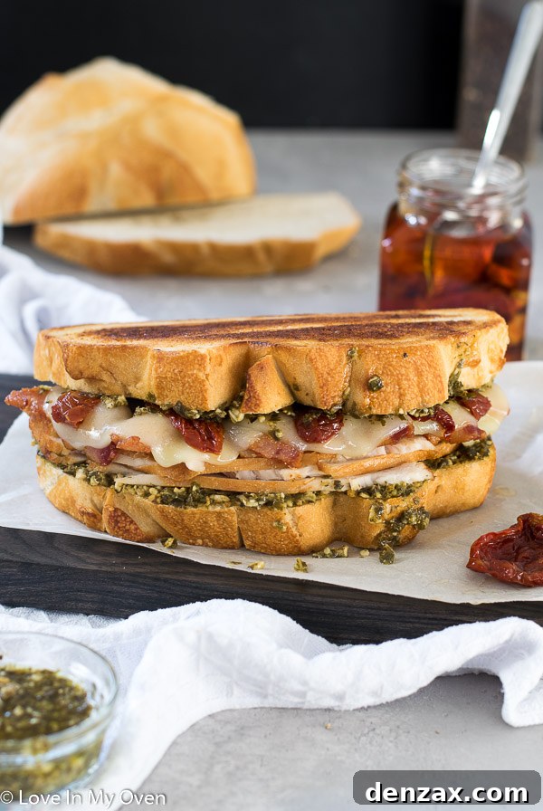 Homemade turkey pesto sandwich ready to be enjoyed