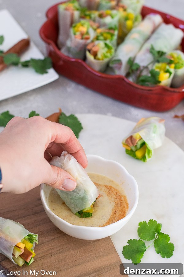 Close-up of a single turkey pepperoni salad roll, perfectly rolled and ready to be dipped.