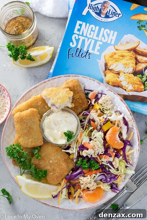 Crunchy Ramen Noodle Salad paired with crispy fish fillets, a perfect easy weeknight meal.