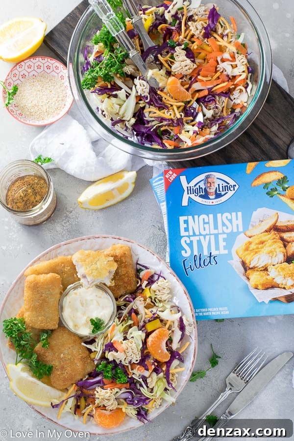Overhead shot of the complete meal: Crunchy Ramen Noodle Salad and crispy fish fillets.