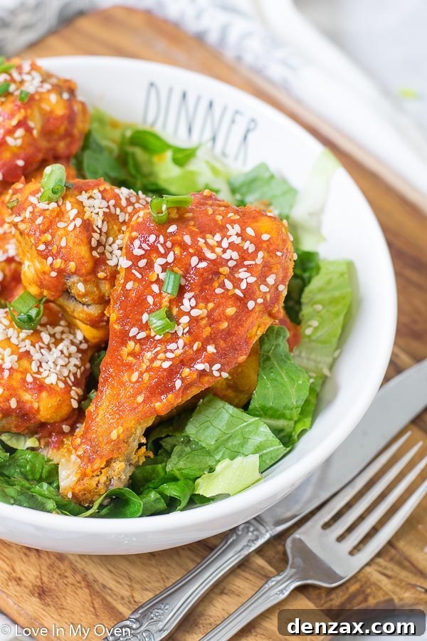 Honey Sriracha Chicken Drumsticks Garnished and Ready to Serve