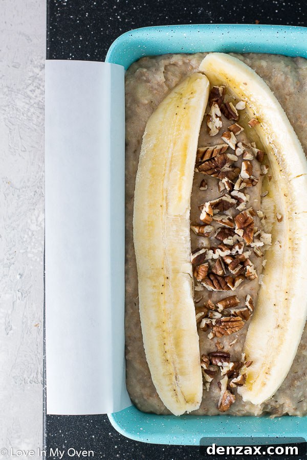 sliced healthier banana bread on a wire rack