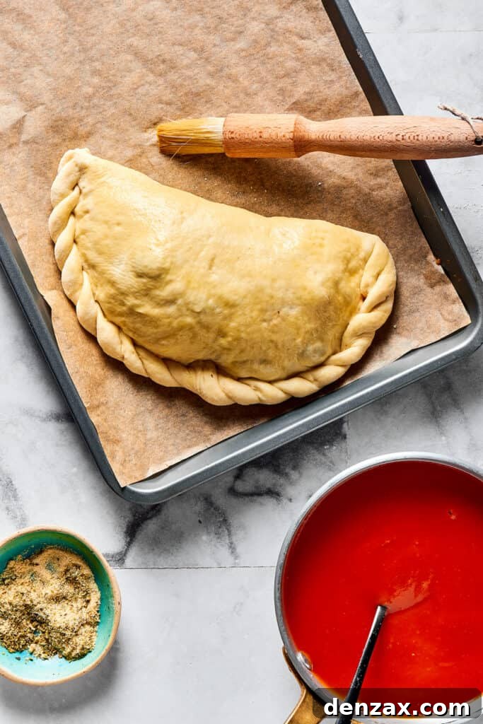 A folded calzone with crimped edges.