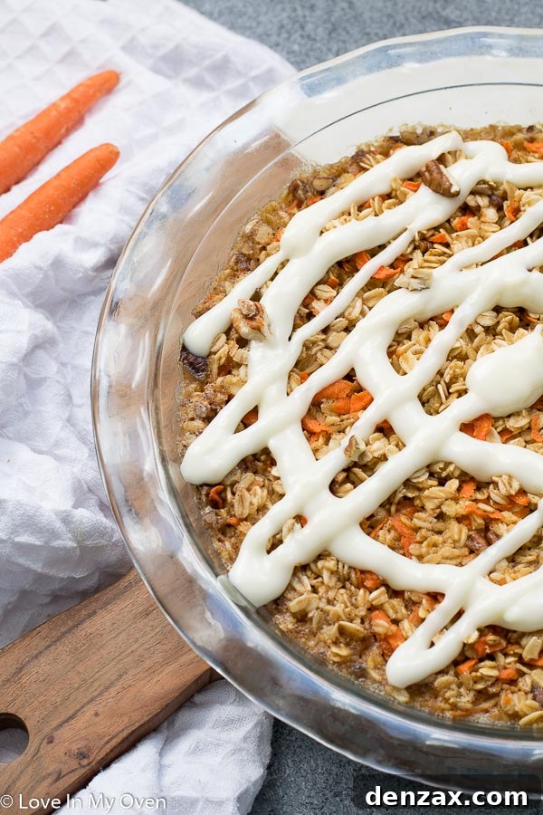 A slice of Carrot Cake Baked Oatmeal on a plate, ready to eat