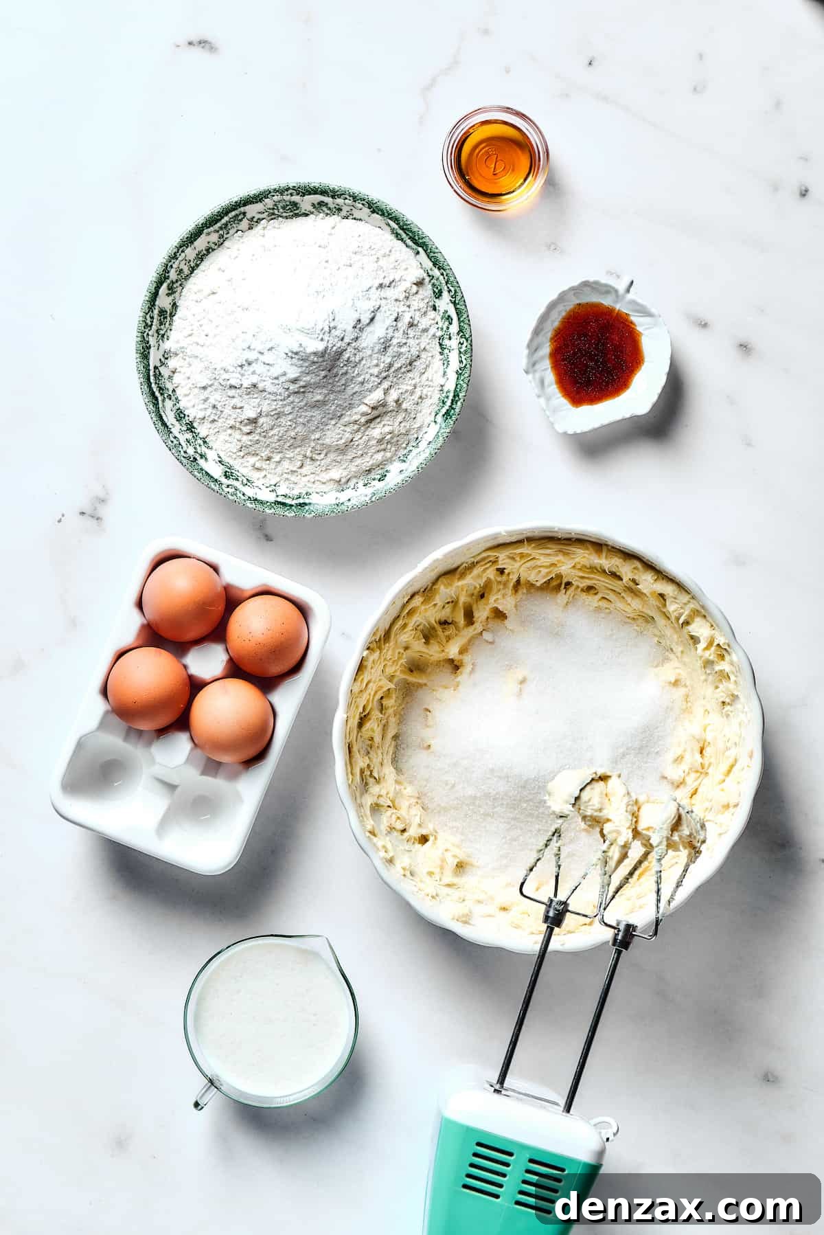 Creaming butter and sugar together in a stand mixer, demonstrating a key step in making a pound cake.