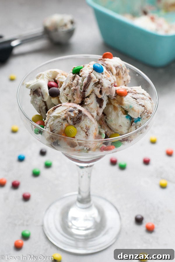 Delicious no-churn vanilla ice cream with chocolate ganache, dulce de leche, and M&M's