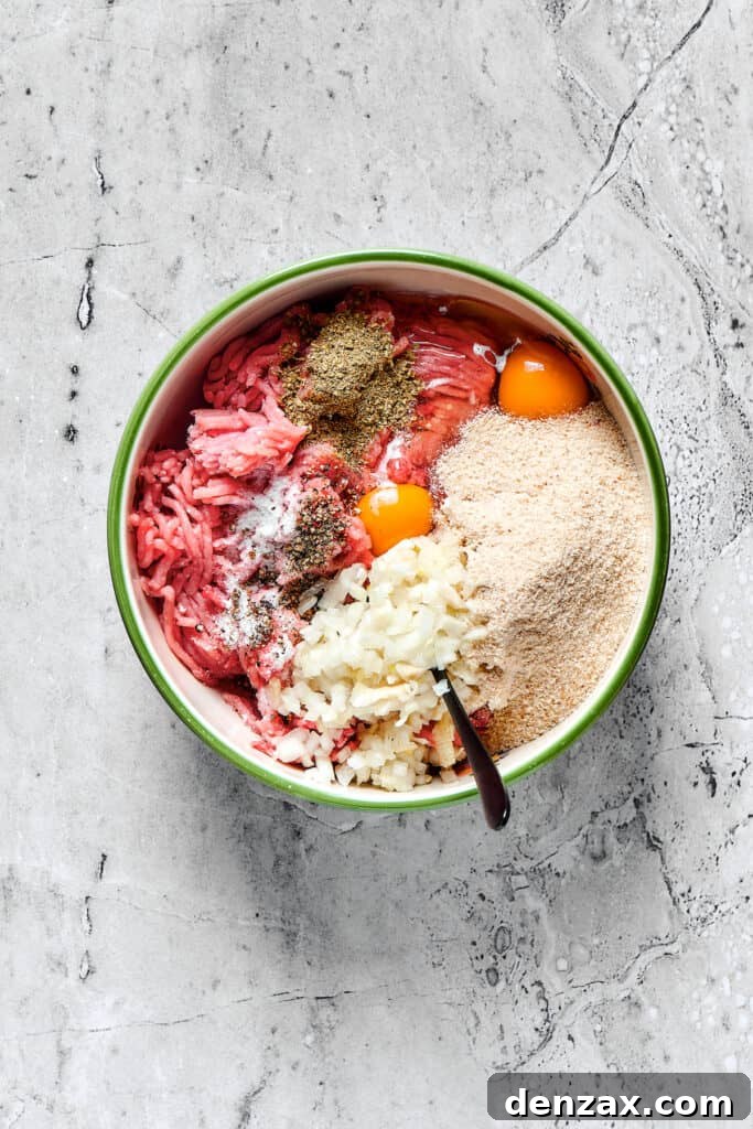 Meatball ingredients in a mixing bowl.