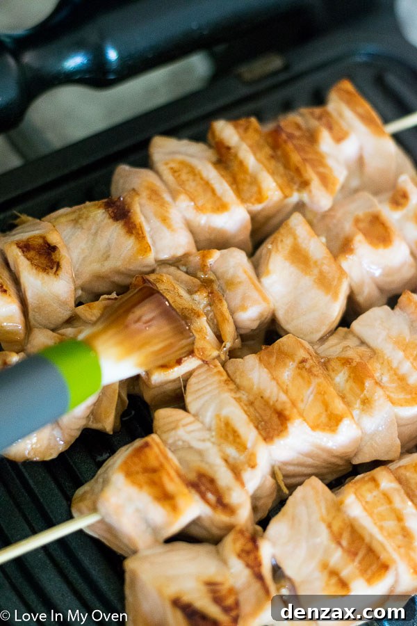Close-up of grilled teriyaki salmon bites