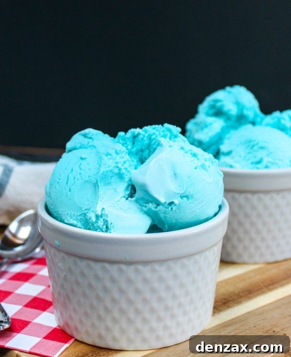 25 Irresistible No-Churn Ice Cream Creations 20 Vibrant No-Churn Blue Moon Ice Cream scoop in a cone