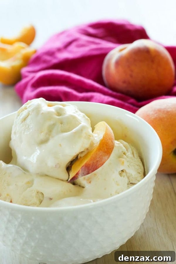25 Irresistible No-Churn Ice Cream Creations 5 Fresh No-Churn Peach Ice Cream with real peach chunks in a serving bowl