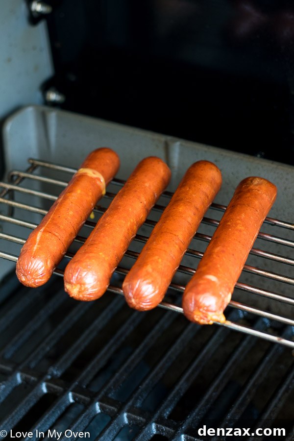 Cooked cheddar smokies ready to be sliced for quesadillas.