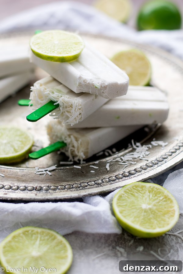 Refreshing 3-ingredient coconut lime popsicles with shredded coconut topping, perfect for summer.