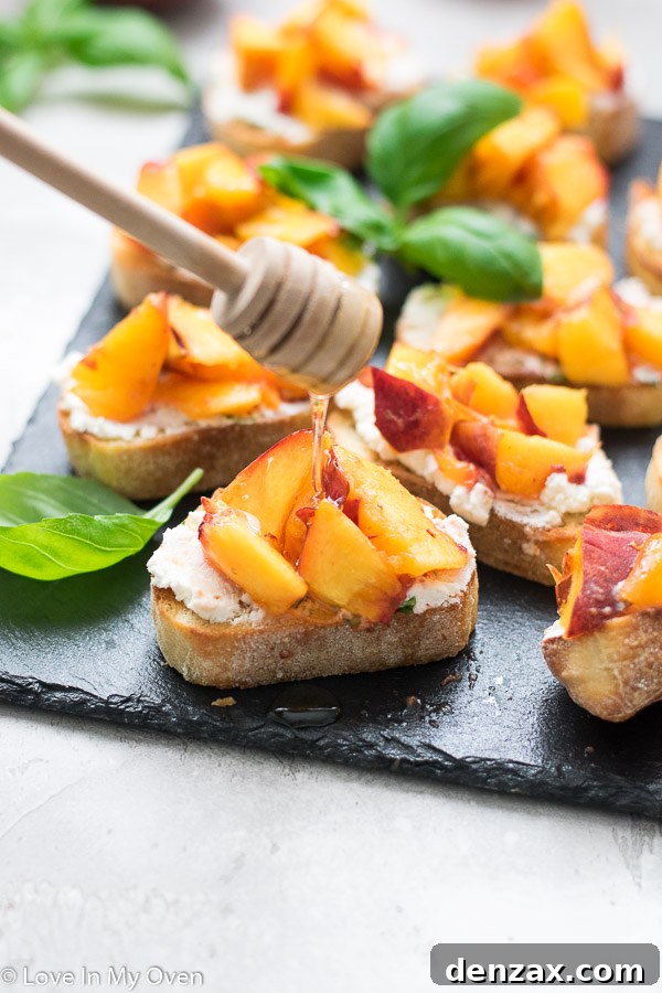 Finished grilled peach crostini arranged on a platter