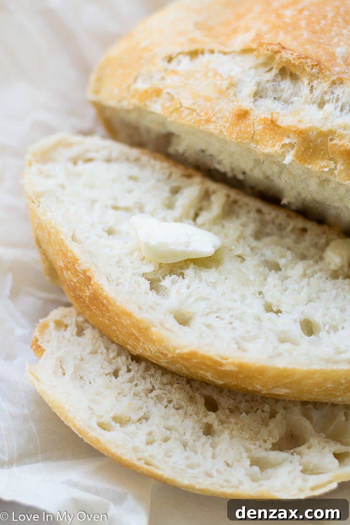 Close-up of the perfectly risen 3-ingredient bread dough in a bowl, showing its shaggy texture.