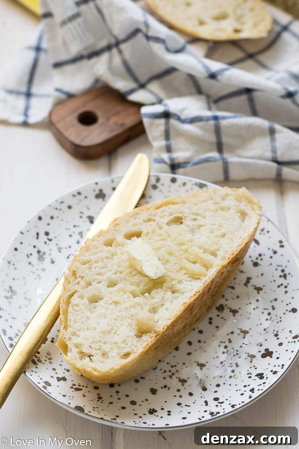 The 3-ingredient bread sliced and ready to be served, highlighting its perfectly baked interior.