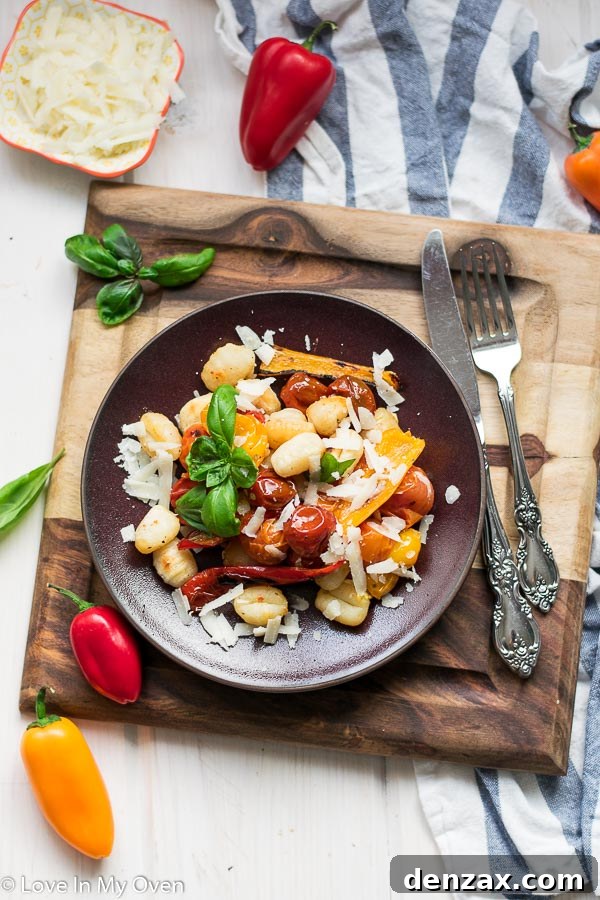 Freshly cooked crispy sheet pan gnocchi garnished with basil