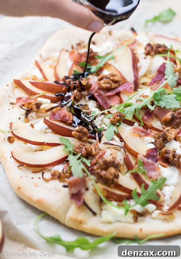 Thinly sliced pear on goat cheese pizza