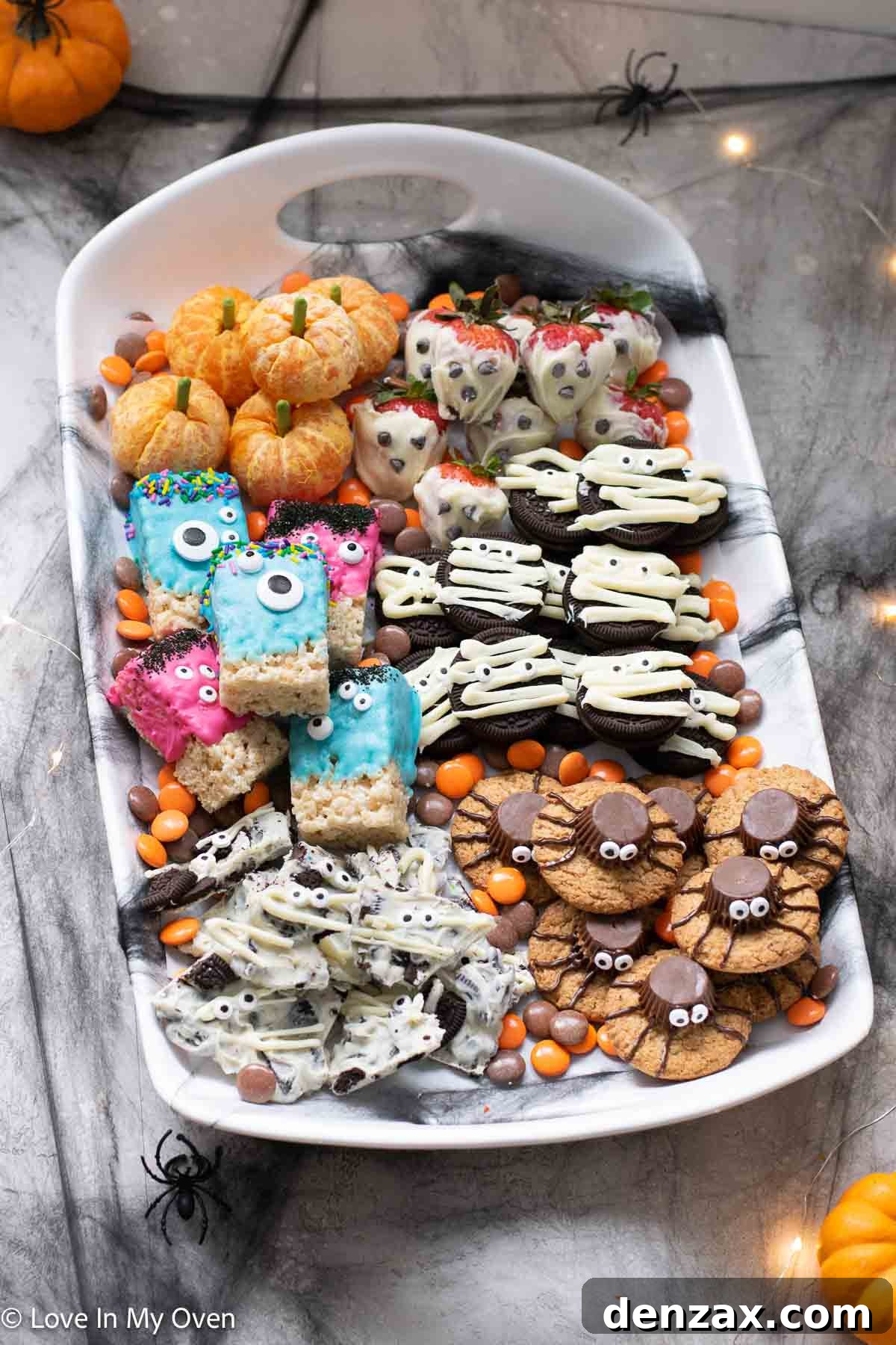 Spooky Sweet Creations for Kids 3 A close-up of a decorative Halloween platter laden with homemade spooky treats, perfect for a party.