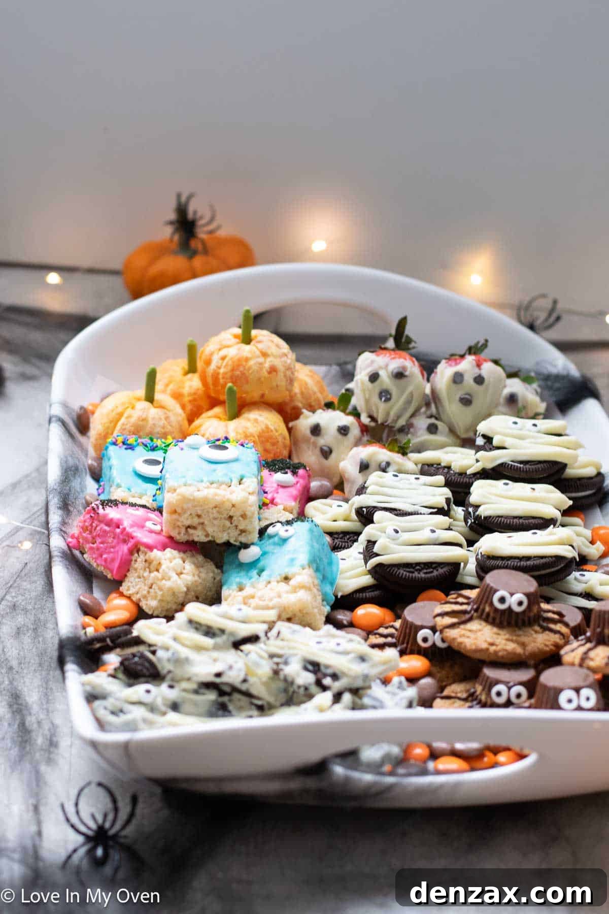 Spooky Sweet Creations for Kids 16 Overhead shot of an assortment of delightful Halloween themed treats, perfect for kids.