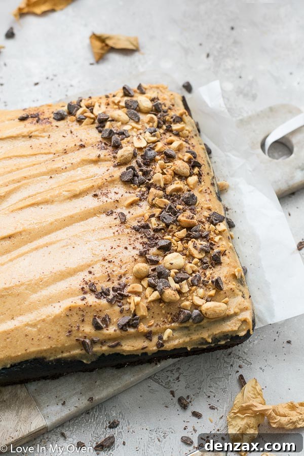 Close-up of the Healthier Chocolate Peanut Butter Sheet Cake, showing the smooth frosting and cake texture