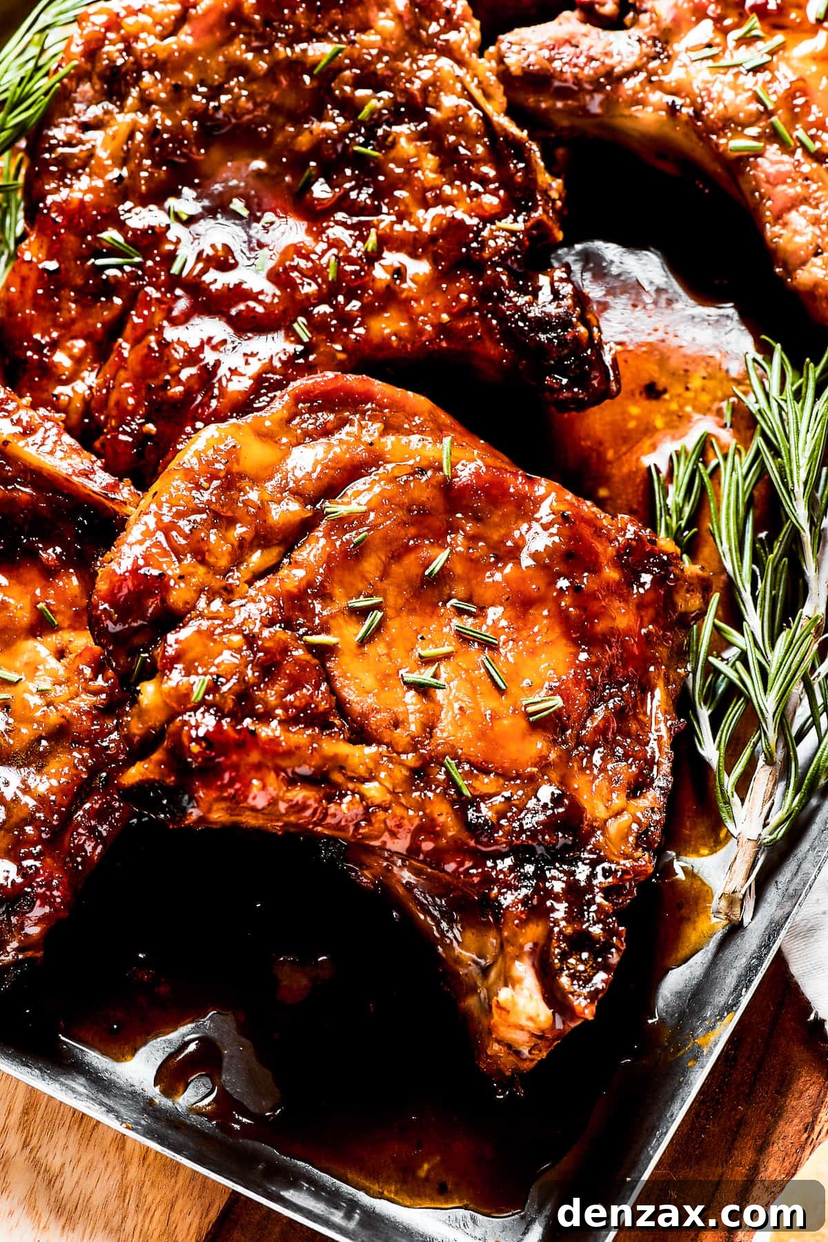 Gorgeous Brown Sugar Pork Chops may look fancy, but they are actually so simple to make! Savory, pan-fried chops with brown sugar glaze. Pork chops glazed in brown sugar sauce, garnished with herbs.