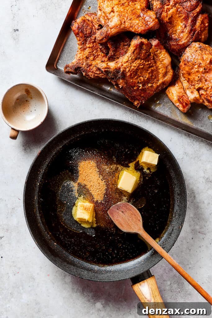 Gorgeous Brown Sugar Pork Chops may look fancy, but they are actually so simple to make! Savory, pan-fried chops with brown sugar glaze. Making pan sauce with butter and brown sugar in a skillet.