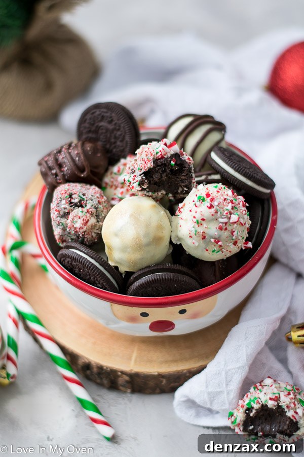 Delicious 3-ingredient Oreo truffles coated in white chocolate and decorated