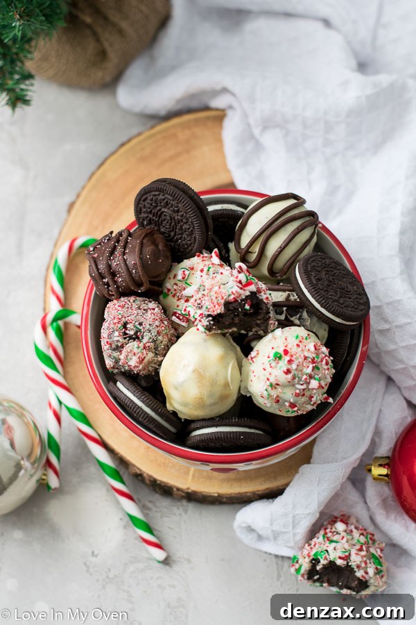 A plate of finished white chocolate Oreo truffles, some with sprinkles