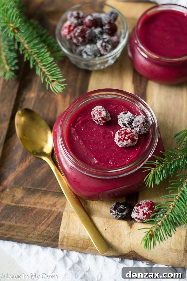 Vibrant Cranberry Curd 5 Cranberry curd served beautifully on a plate.